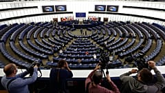 Reporters film European Parliament President David Sassoli officially opening a session in Strasbourg, eastern France, June 7, 2021. 