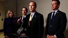 In this May 28, 2019 file photo, Rep. Adam Schiff, D-Calif., centre, and Rep. Eric Swalwell, D-Calif., right, speak with members of the media on Capitol Hill in Washington. 