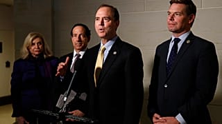 In this May 28, 2019 file photo, Rep. Adam Schiff, D-Calif., centre, and Rep. Eric Swalwell, D-Calif., right, speak with members of the media on Capitol Hill in Washington. 