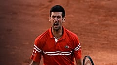 Serbia's Novak Djokovic defeats Stefanos Tsitsipas of Greece 6-7, 2-6, 6-3, 6-2, 6-4 to win the French Open Sunday, June 13, 2021