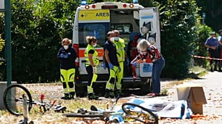 Ambulance personnel pictured at the scene of the shooting in Ardea on Sunday.