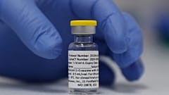 A vial of the Phase 3 Novavax coronavirus vaccine is seen ready for use in the trial at St. George's University hospital in London.