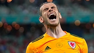 Wales' Gareth Bale celebrates after his teammate Wales' Connor Roberts scored his sides second goal