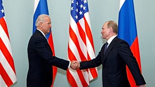 Première poignée de main entre Joe Biden et Vladimir Poutine