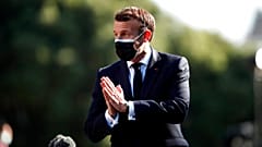 French President Emmanuel Macron arrives for an EU summit at the Crystal Palace in Porto, Portugal, Saturday, May 8, 2021