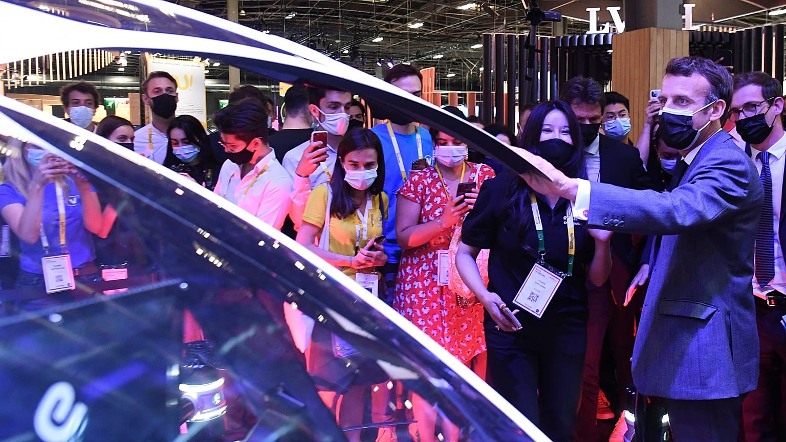 French President Emmanuel Macron visits stands at the VivaTech startup and tech event in Paris Wednesday, June 16, 2021.