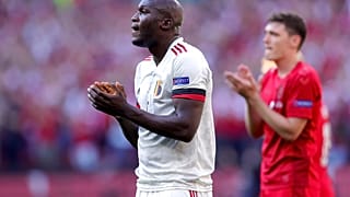 Belgium's Romelu Lukaku applauds during the break at the tenth minute to honour Denmark's Christian Eriksen during the Euro 2020 group B match between Denm