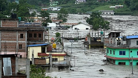 Houses submerged in flood waters in Sindhupalchok, some 70 km northeast of Kathmandu.