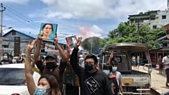 Protesters carried photos of ousted leader Suu Kyi