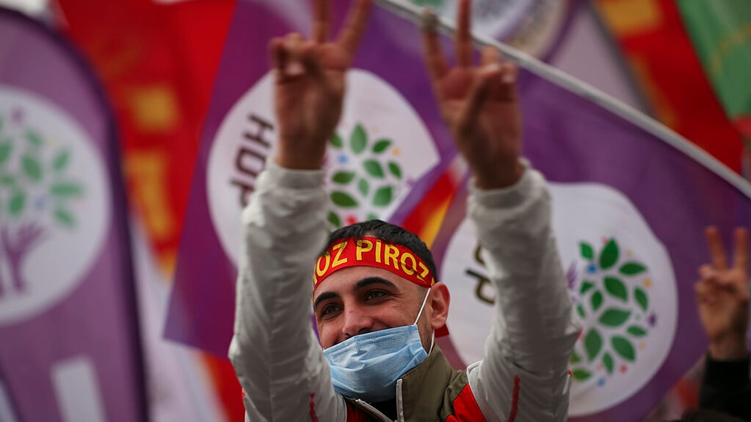 A member of the People's Democratic Party, or HDP, attends the start of Nowruz - or New Year - celebrations in Istanbul, Turkey in March