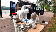Italian forensic police on the scene at Lake Garda after the bodies of an Italian man and woman were found on Sunday