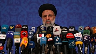 FILE: Iran's new President-elect Ebrahim Raisi speaks during a press conference in Tehran, Iran, Monday, June 21, 2021.