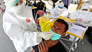 Virus Outbreak Indonesia