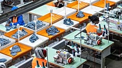 Workers operate sewing machines at a factory in Ethiopia in 2019. Photo taken pre-pandemic, before the study was carried out. 