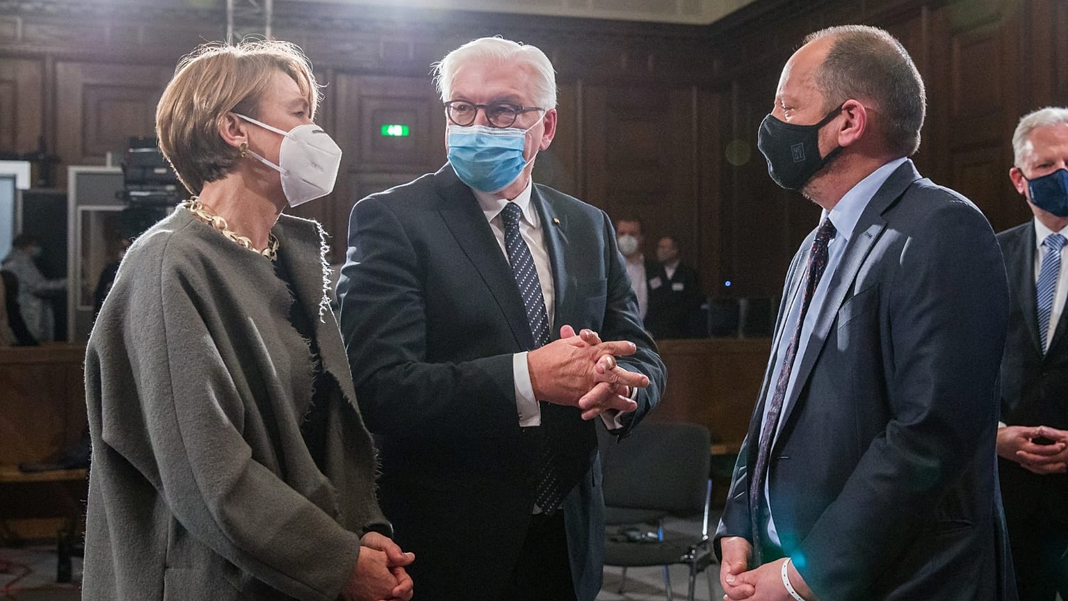 German President Frank-Walter Steinmeier (C) and his wife Elke Buedenbender talk with Philippe Sands, author, lawyer and international law expert