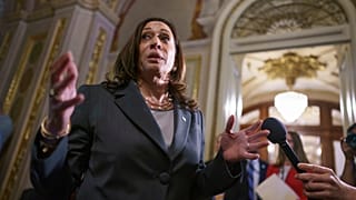 US Vice President Kamala Harris leaves the Senate chamber following the procedural vote on the For the People Act, at the Capitol in Washington, June 22, 2021.