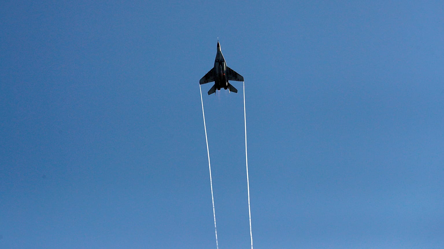 A Serbian Army MiG-29 jet fighter performs over Batajnica during military exercises.