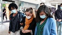 Valerie Bacot, centre, arrives with relatives at the Chalon-sur-Saone courthouse, central France, Thursday, June 24, 2021. 