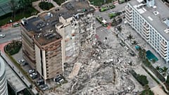 ABD'nin Miami şehrinde çöken 12 katlı binada enkazı altında en az 160 kişinin olduğu tahmin ediliyor.