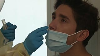 A student being tested for Covid-19