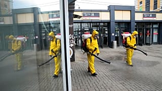 Employees of the Federal State Center for Special Risk Rescue Operations of Russia Emergency Situations, disinfect a platform in Moscow. 25 June 2021