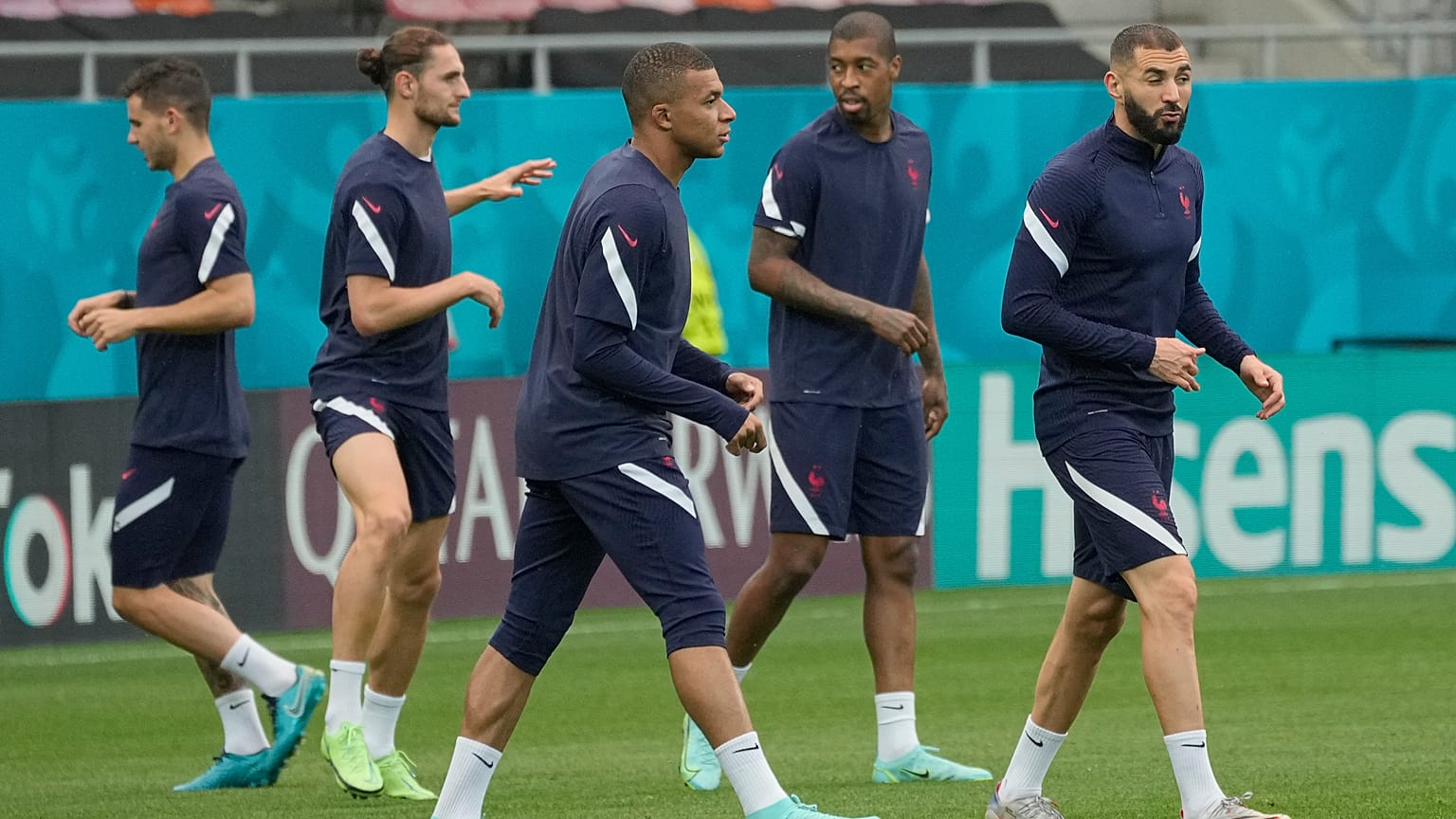 France's Kylian Mbappe warms up during a training session at the National Arena stadium in Bucharest, Romania, Sunday, June 27, 2021.