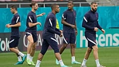 France's Kylian Mbappe warms up during a training session at the National Arena stadium in Bucharest, Romania, Sunday, June 27, 2021.