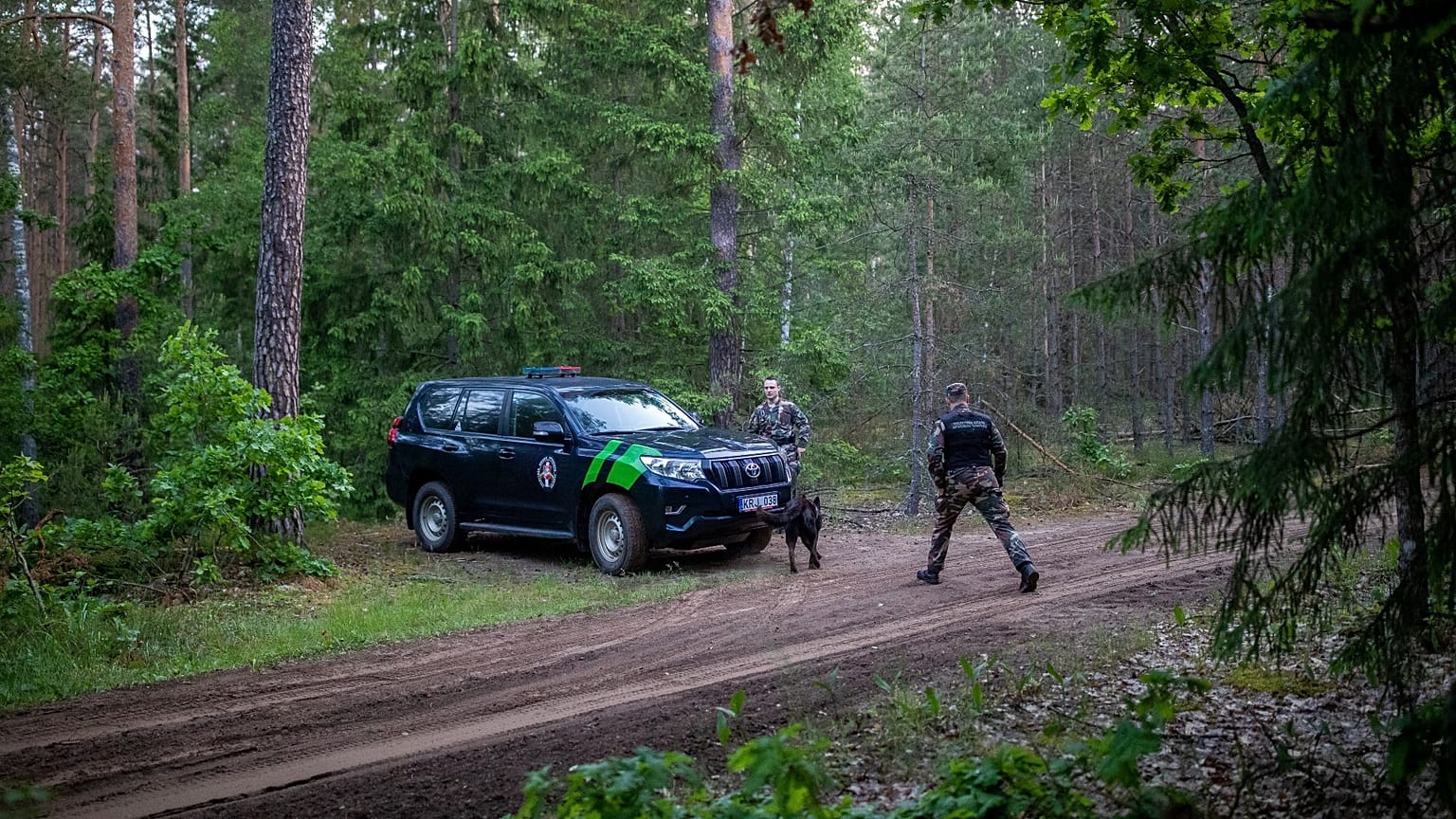 Members of the Lithuania State Border Guard Service patrol on the border with Belarus on  June 10, 2021. 