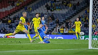Ukraine's Artem Dovbyk scores his team's winning goal during the Euro 2020 round of 16 match between Sweden and Ukraine at Hampden Park in Glasgow, Tuesday, June 29, 2021.