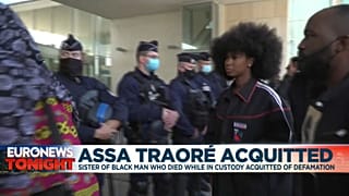 Assa Traoré surrounded by supporters and lawyer in front of the court in Pontoise.