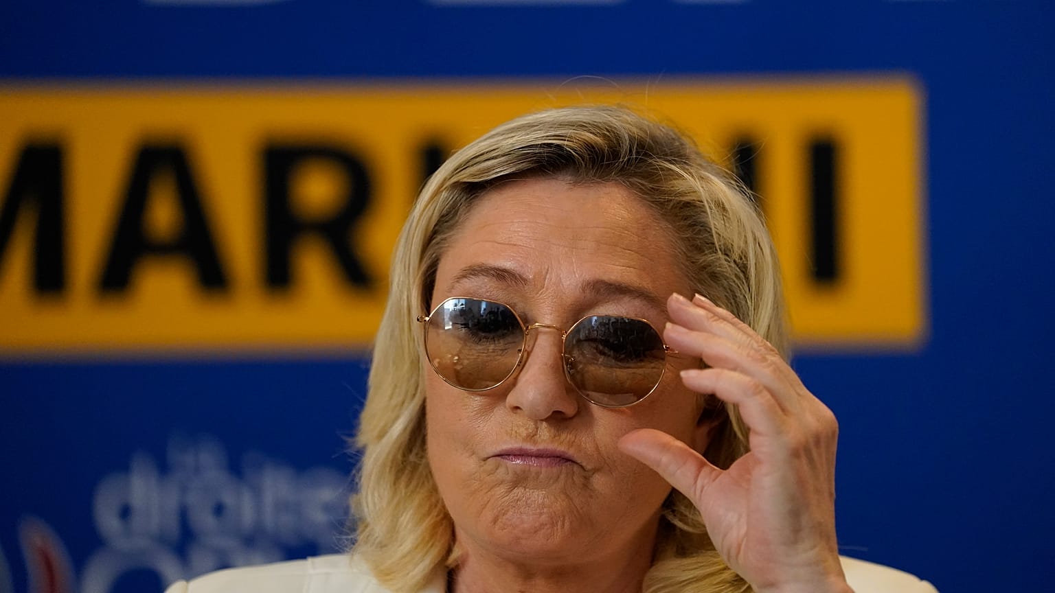 FILE: Far-right leader Marine le Pen attends a press conference in Toulon, southern France, Thursday, June 17, 2021.