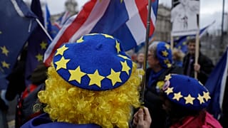In this file photo dated Wednesday, Jan. 8, 2020, pro-Europe protesters demonstrate against Britain's Brexit split from the Bloc, outside the Houses of Parliament in London.