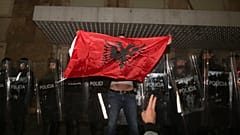 Three senior police officers were among those arrested, Albanian authorities said.