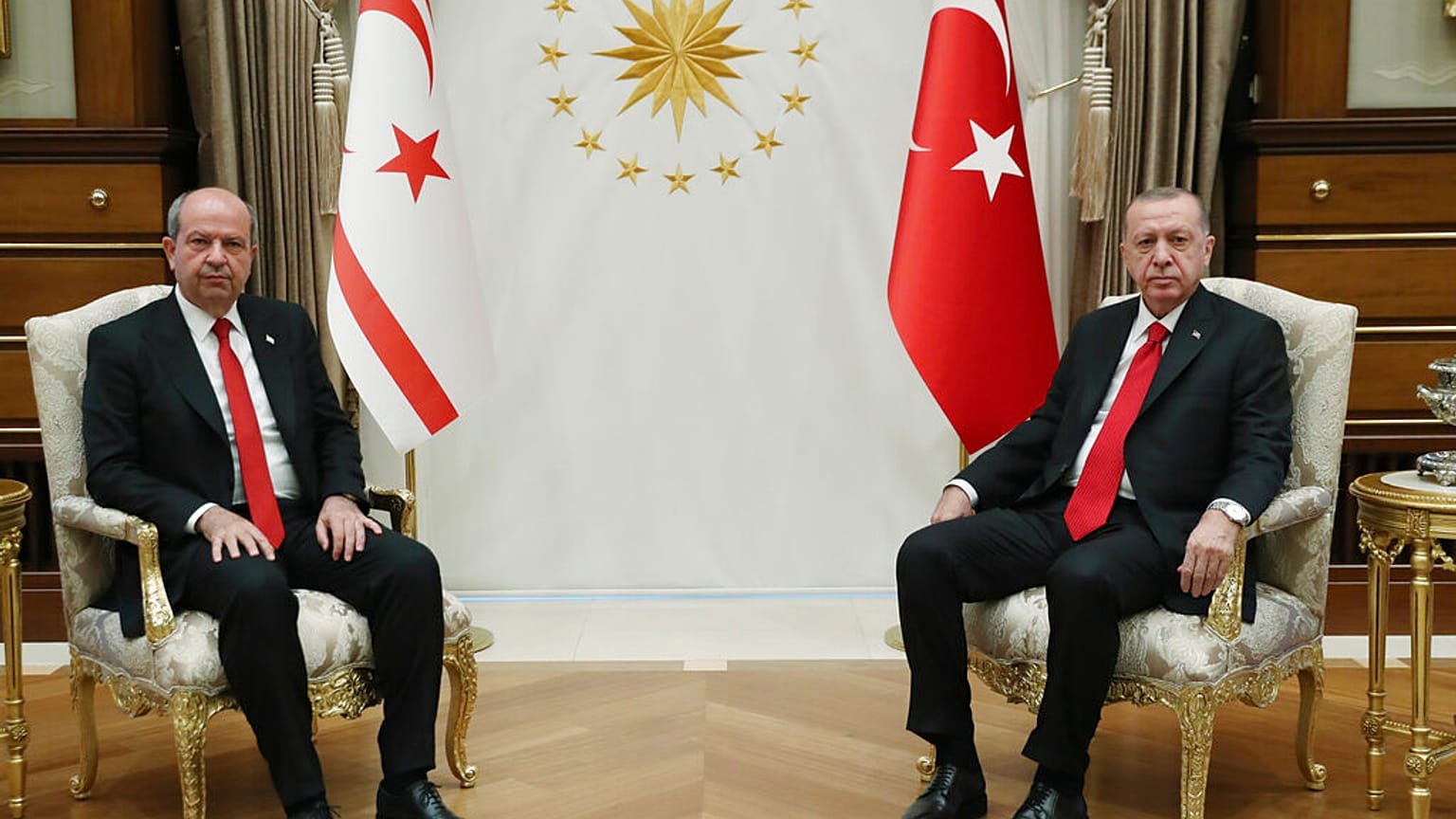 Turkey's President Recep Tayyip Erdogan, right, and Ersin Tatar