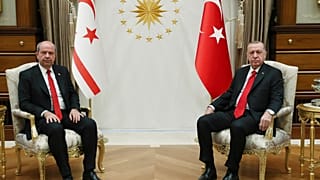 Turkey's President Recep Tayyip Erdogan, right, and Ersin Tatar