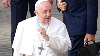 In this June 30, 2021 file photo, Pope Francis arrives for his weekly general audience with a limited number of faithful in the San Damaso Courtyard at the Vatican. 