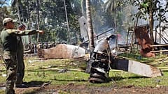 Parts of a Lockheed C-130 Hercules plane at the crash site in Patikul town, Sulu province