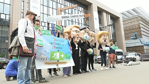 Protesters against the Energy Charter Treaty