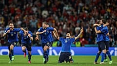 Italy's players celebrate winning on penalties
