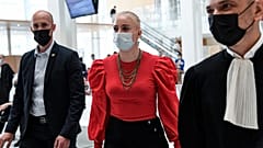 18-year-old Mila arrives at the Paris courtroom with her lawyer last month.