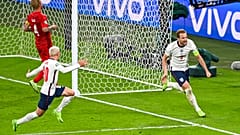 England's Harry Kane, right, reacts after scoring his team's second goal during the Euro 2020 soccer championship semifinal between England and Denmark at Wembley stadium.