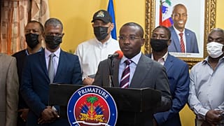 Interim President Claude Joseph speaks during a press conference at his residence in Port-au-Prince, Haiti