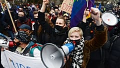 Women protest the newly-introduced, prohibitive abortion law Warsaw on January 27, 2021 