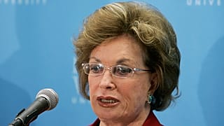 Jehan Sadat speaks at a news conference before speaking during the William Siebens American Heritage lecture series at Buena Vista University in 2006.