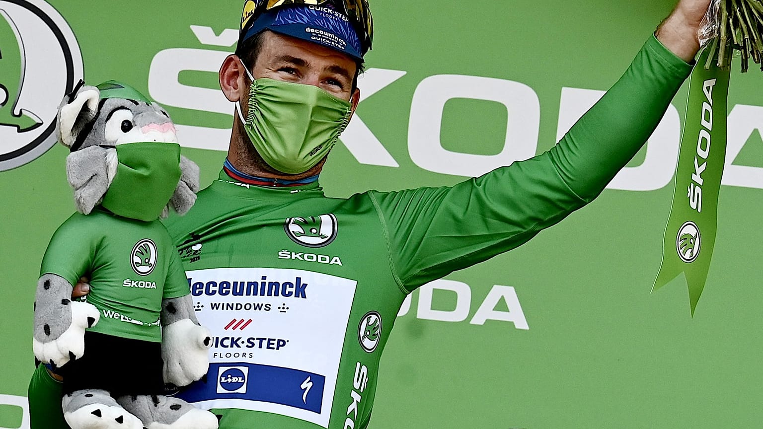 Stage winner Team Deceuninck Quickstep's Mark Cavendish of Great Britain on the podium at the end of the 13th stage of the 108th Tour de France, on July 9, 2021.