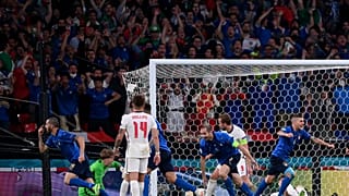 Italy's Leonardo Bonucci, left, celebrates after scoring his side's first goal during the Euro 2020.