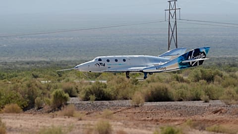 The Virgin Galactic rocket plane, with founder Richard Branson and other crew members on board, lands back in Spaceport America near Truth or Consequences, N.M., July 11, 2021