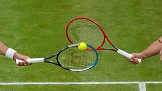 Sfida di racchette sull'erba di Wimbledon.