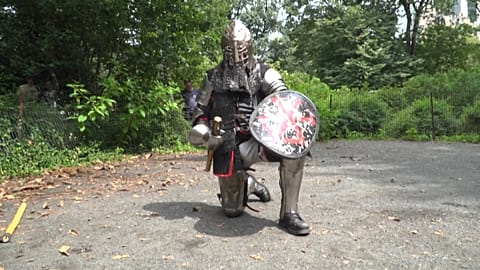 Knight kneeling before the fight