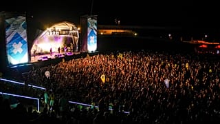People attend the Cruilla music festival in Barcelona, Spain, Friday, July 9, 2021. 